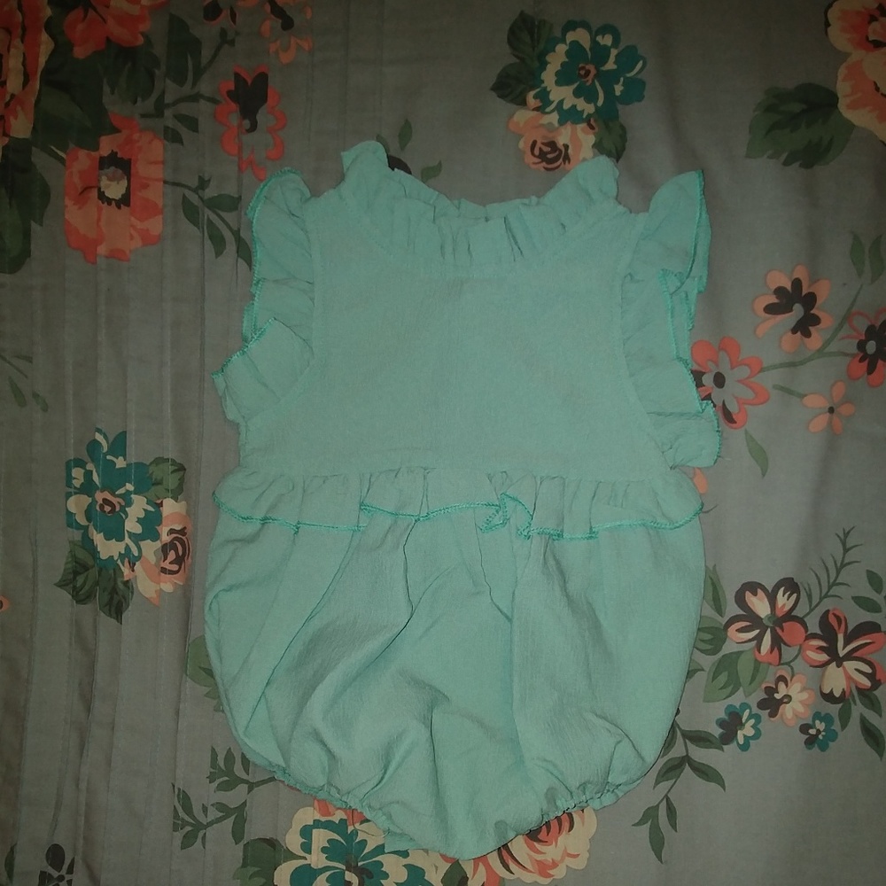 Green ruffle romper